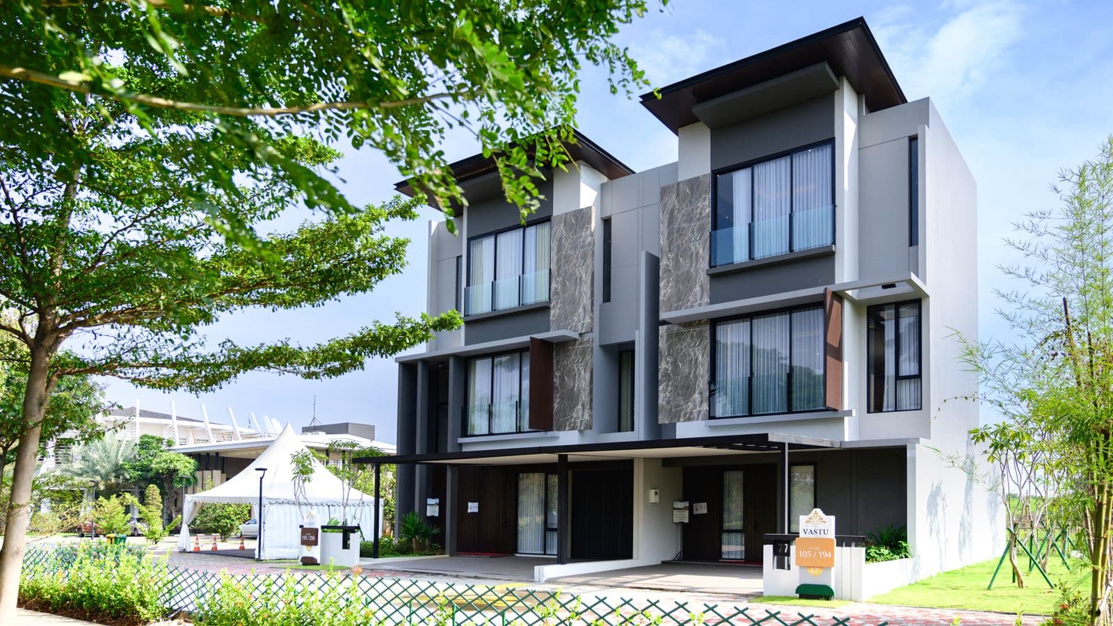 Modern residential building surrounded by greenery